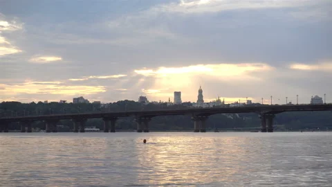 4K view of the Dnieper river, bridge and cityscape at sunset. Stock Footage 137793855