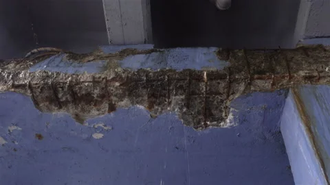 4K view of falling water drops from a rotten ceiling Stock Footage 141544761