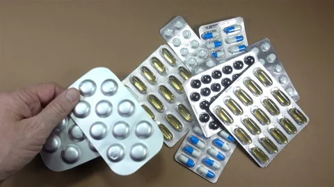 4K view of hand takes blisters with pills Stock Footage 143163071