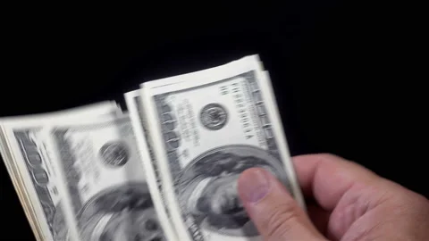4K view of hands counting one hundred dollar bills Stock Footage 139743670
