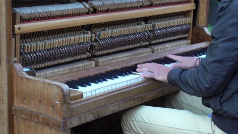 4K view of hands of a muzakant play the keys of a piano. Stock Footage 112337556
