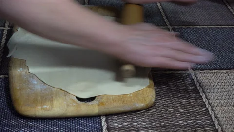 4K view of hands rolling dough with a rolling pin Video stock 123102573