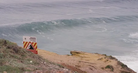 4K view from high seashore cliffs on rolling tidal waves of Atlantic ocean Stock Footage 163077349