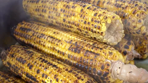 4K view of hot fried corn with smoke over it close-up. Stock Footage 88546857