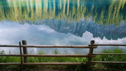 4K view of Latemar reflected on Lake Carezza Stock Footage 95008783