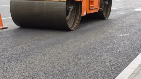 4K view of a machine skating rink paver laying asphalt Stock Footage 122492725