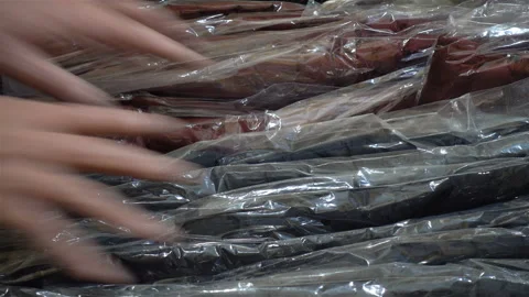 4K view of men's hands taking packages with things out of packaging Stock Footage 126788425