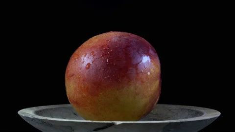 4K view of nectarine on a rotating plate. Stock Footage 138792841