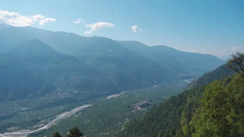 4k View of the paraglider taking off from the green mountain peak at Dobhi in Ma 스톡 동영상 218445210