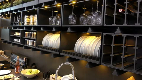 4K view of plates, glasses of modern kitchen furniture. Stock Footage 87189308
