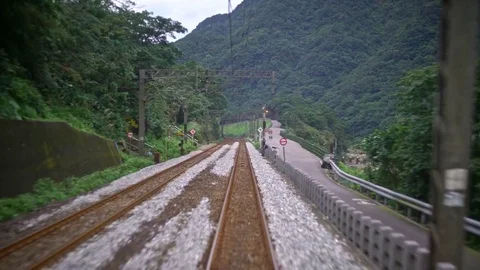 4K View of rails train in jungle and mountain. Trip countryside at Taiwan -Dan Stock Footage 75781226