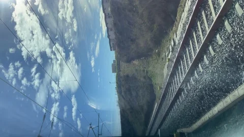 4K. View to the railway through the train window. Vertical. 스톡 동영상 193140046