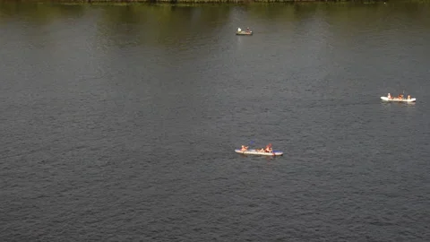 4K view of the river with floating boats. Stock Footage 154857536