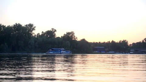 4K view of the river with a ship at sunset. Stock Footage 199678671