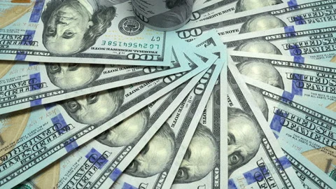 4K view of a rotating one hundred dollar bills Stock Footage 129595970