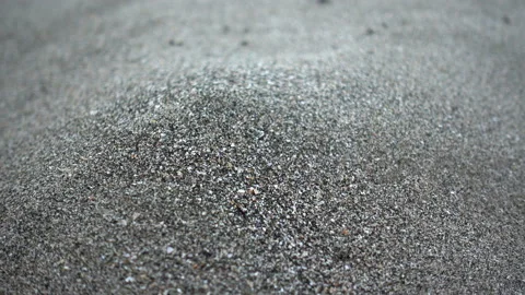 4K view of sand trickle pours and forms a hill. Stock Footage 114294116