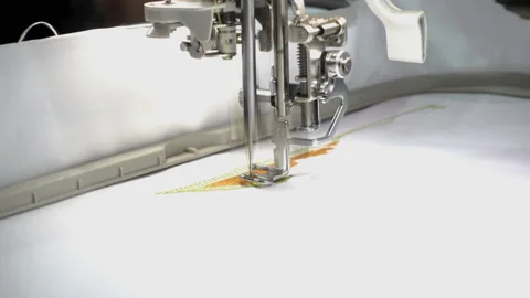 4K view of sewing machine embroider a pattern on the fabric close-up. Stock Footage 88547941