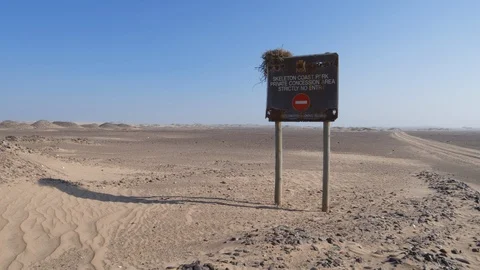 4k view of the Skeleton coast park, no entry sign, Namibia Stock Footage 95208867