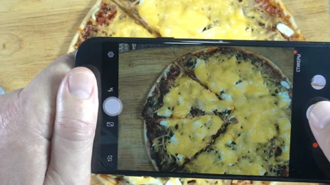 4K view of smartphone and taking sliced pizza photos. Stock Footage 133243478