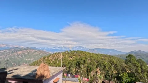 4K View of Snow-Capped Himalayas from a Village in Gwaldam, Uttarakhand, India Stock Footage 310880971