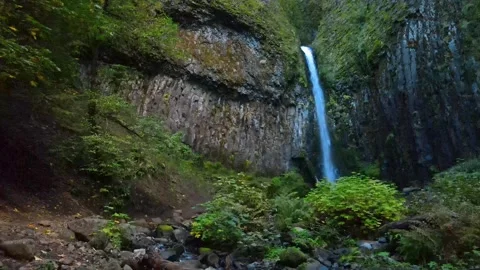 4K View of tall waterfall Stock Footage 241140684