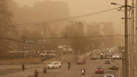 4K View of traffic during a sandstorm in Beijing, China. Stock Footage 150501513