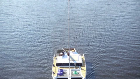4K view of a yacht passing through calm water Stock Footage 199679003