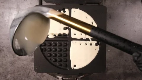 4K Waffle Batter Pouring Top Down Stock Footage 332507574