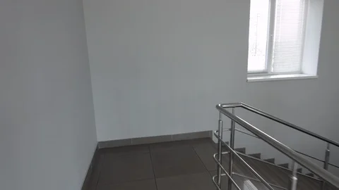 4K Walk Down via Stairs inside a building Stock-Footage 96208527