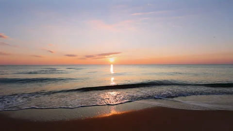 4K Walking on the beach. Dramatic sea sunrise. Burning sky Stock Footage 169821305