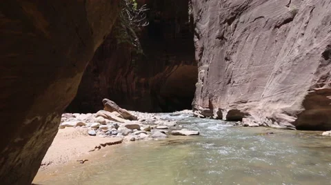 4K Walking through a river in a canyon Stock Footage 45709319