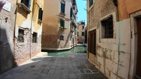 4K. Walking through a typical street in city of Venice, Italy. Subjective shot. Stock Footage 105259522