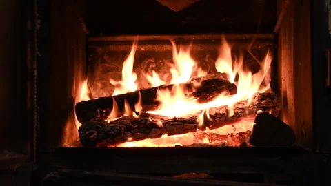 4K Warm cozy burning fire in a brick fireplace, close-up shot Vídeo Stock 146011378