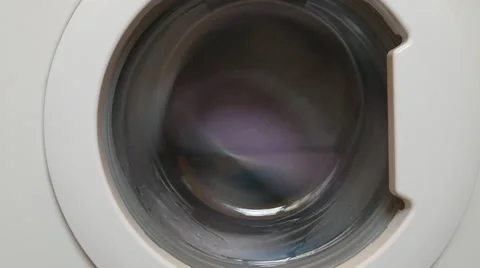 4K Washing machine turning on high speed - front view Stock Footage 56826440