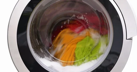 4K - Washing machine washes colored clothes. Close-up Stock-Footage 102765093