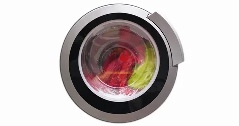 4K - Washing machine washes colored clothes Stock Footage 102772837