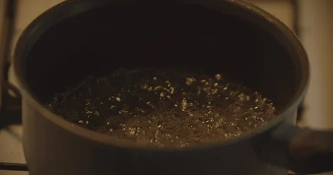 4K Water Boiling In A Pot Medium Slow Motion Stock Footage