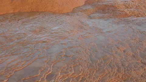 4k Water lapsing over red rock formation. Video stock 72257322