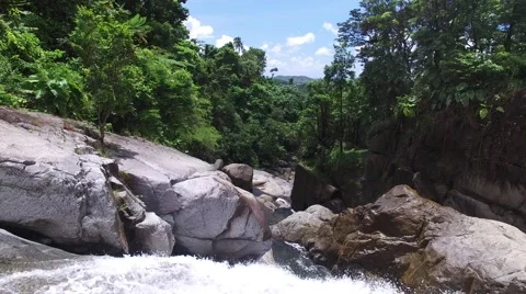 4K Waterfall Camera Fly Over into Rainforest Stock Footage