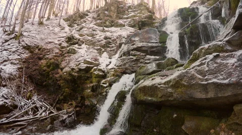 4k, Waterfall in mountain locality in winter Video stock 46626615