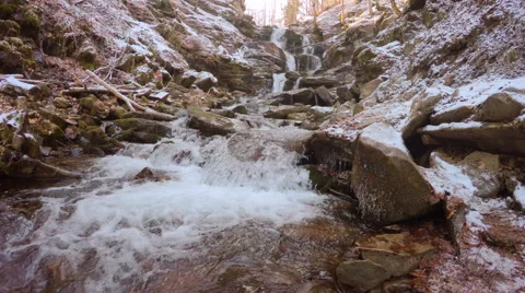 4k, Waterfall in mountain locality in winter Video stock 46629982