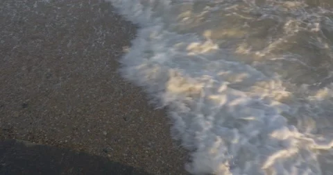 4K | Waves break up against sea shore Stock Footage 47715866