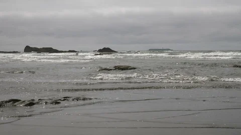 4K Waves Coming In Steadily With Destruction Island Lighthouse In Background Video stock 109136977