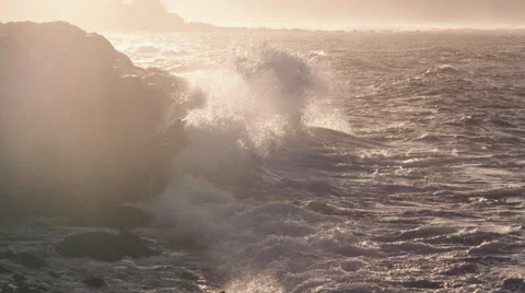 4K: Waves Crashing (Slow Motion) Onto Rocks in Epic Light Stock Footage 68447655