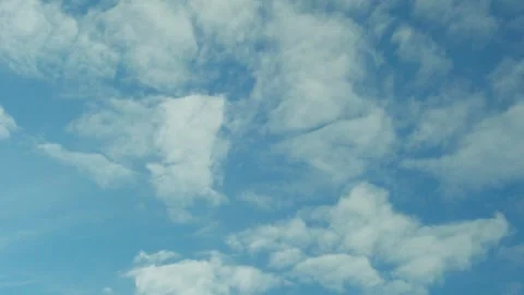 4K white clouds and azure sky during daytime. Sunny summer blue sky atmosphere a Video stock 332921375