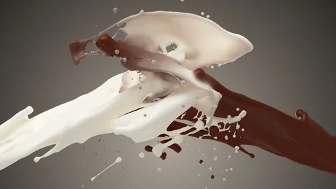 4K. White Milk And Chocolate Splashing. Slow Motion. Stock Footage