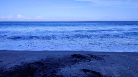 4K - white waves and black sand on the beach Video stock 272422530
