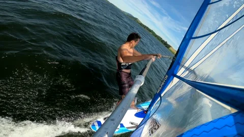 4K wide angle GoPro Windsurfing scene, stabilized Stock Footage 137528077
