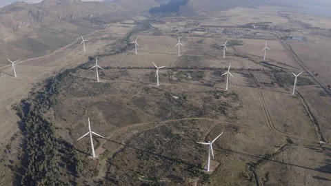 4K wide angle high scenic aerial view of wind turbines turning on a wind farm Stock-Footage 104644453