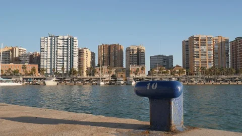 4k wide angle pan shot of a busy touristic pier of a city marina with boats, Stock Footage 123491638